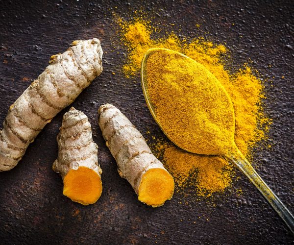 turmeric-roots-and-powder-shot-from-above-royalty-free-image-1588089678